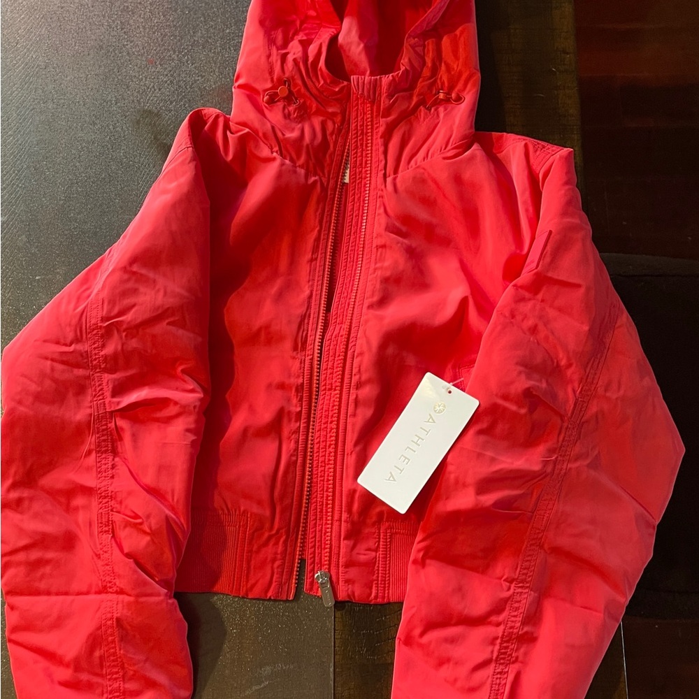 Lucent Bomber Jacket in color “Punch”.